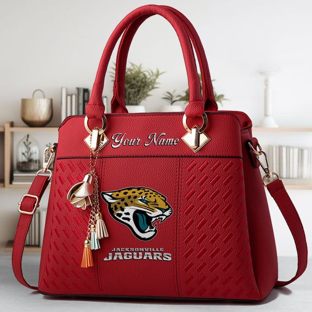 LIMITED EDITION - NEW CUSTOMIZED NFL30 JSJ JACKSONVILLE JAGUARS LUXURY HANDBAG IN MULTIPLE COLORS