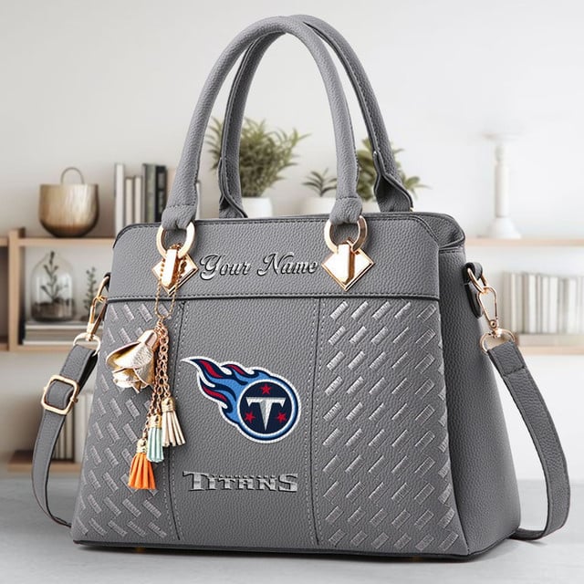 LIMITED EDITION - NEW CUSTOMIZED NFL31 TST TENNESSEE TITANS LUXURY HANDBAG IN MULTIPLE COLORS