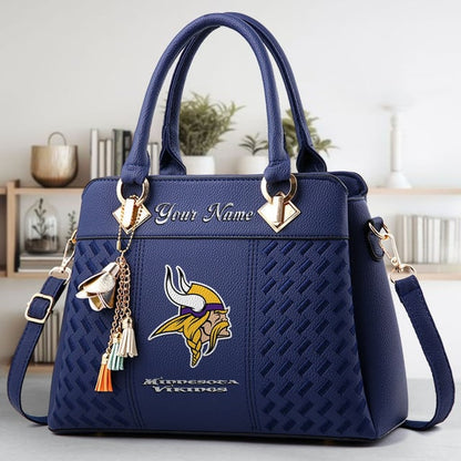 LIMITED EDITION - NEW CUSTOMIZED NFL05 MVK MINNESOTA VIKINGS LUXURY HANDBAG IN MULTIPLE COLORS
