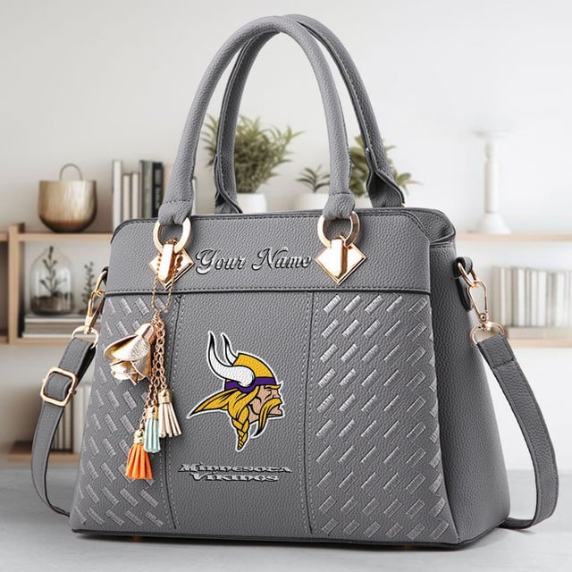 LIMITED EDITION - NEW CUSTOMIZED NFL05 MVK MINNESOTA VIKINGS LUXURY HANDBAG IN MULTIPLE COLORS
