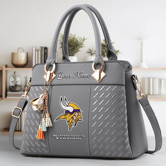 LIMITED EDITION - NEW CUSTOMIZED NFL05 MVK MINNESOTA VIKINGS LUXURY HANDBAG IN MULTIPLE COLORS