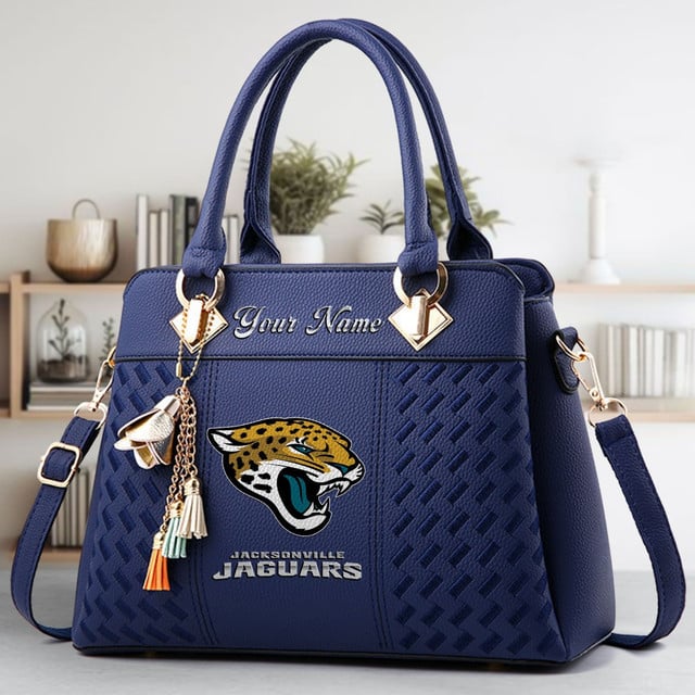 LIMITED EDITION - NEW CUSTOMIZED NFL30 JSJ JACKSONVILLE JAGUARS LUXURY HANDBAG IN MULTIPLE COLORS