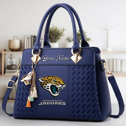 LIMITED EDITION - NEW CUSTOMIZED NFL30 JSJ JACKSONVILLE JAGUARS LUXURY HANDBAG IN MULTIPLE COLORS