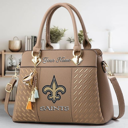 LIMITED EDITION - NEW CUSTOMIZED NFL24 NOS NEW ORLEANS SAINTS LUXURY HANDBAG IN MULTIPLE COLORS