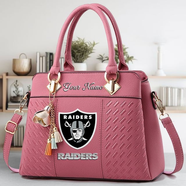 LIMITED EDITION - NEW CUSTOMIZED NFL07 LVR LAS VEGAS RAIDERS LUXURY HANDBAG IN MULTIPLE COLORS